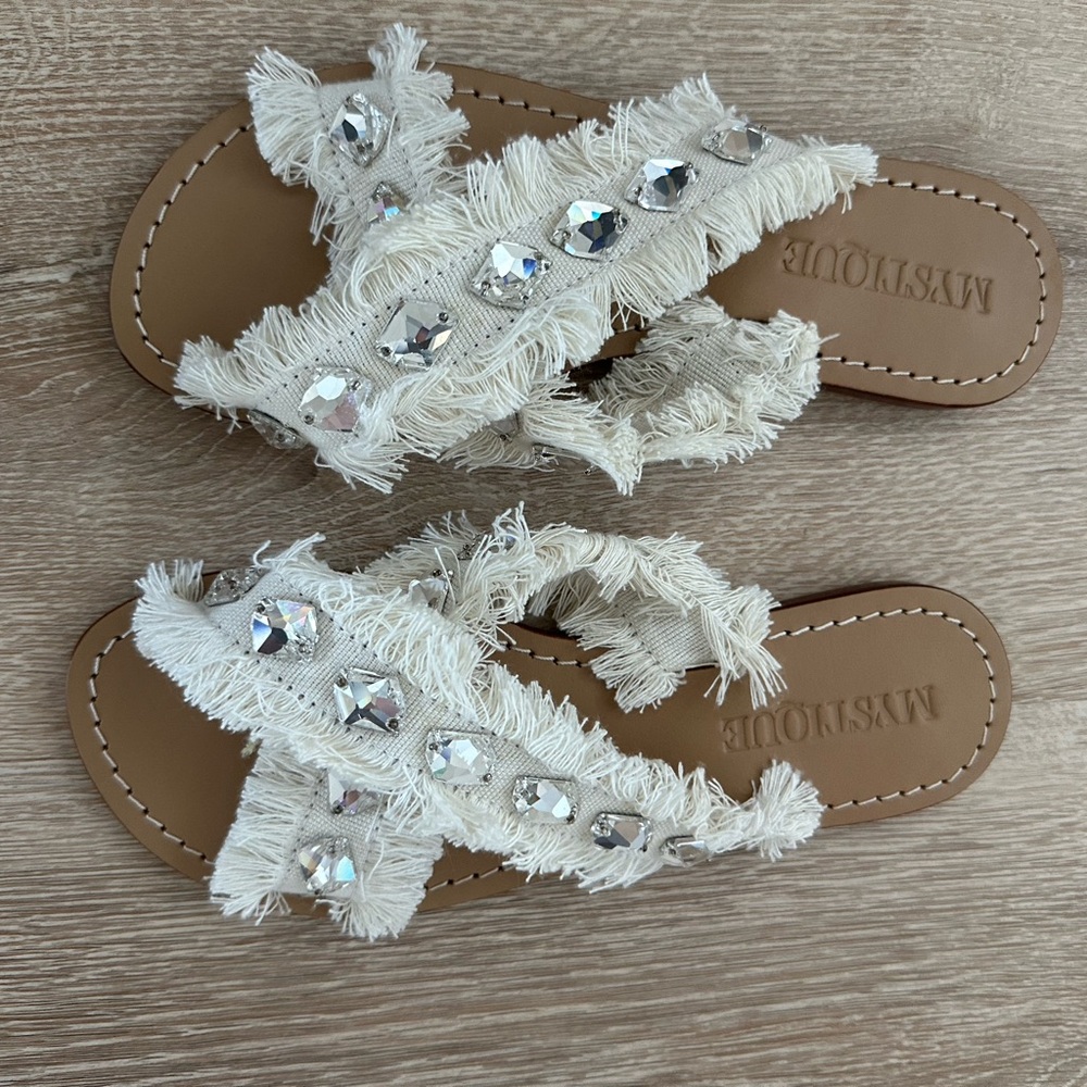 Mystique Boutique Cream Sandals with Textured Straps and Flat Sole